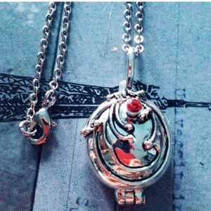 Silver red locket necklace u can put herbs inside witchy goth Vampire Diaries